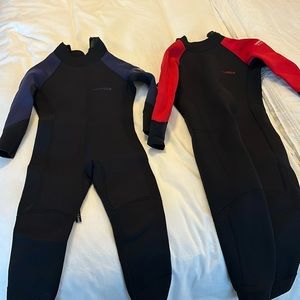 Two kids dark lightning wetsuits (can be sold separately)